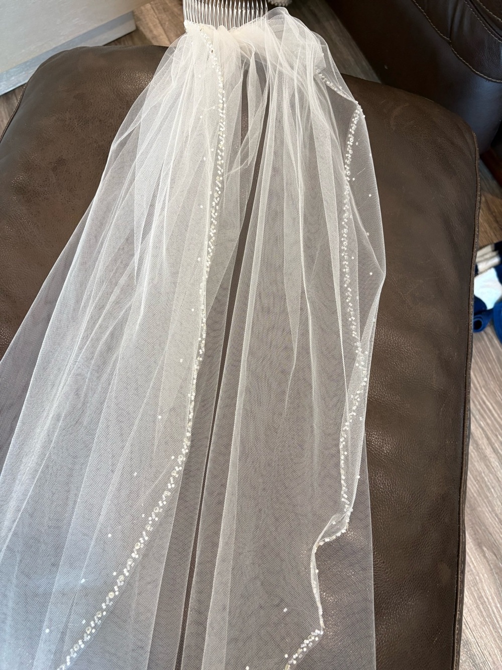 Softy White Tulle fingertip length bridal veil with crystal and pearls